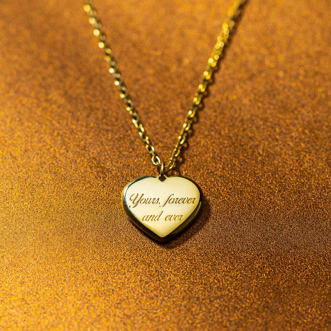 Gold heart-shaped pendant necklace