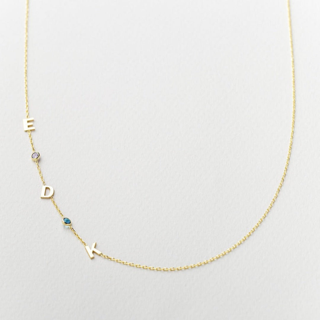 Gold Sideways Cross Necklace with Birthstone and Letter