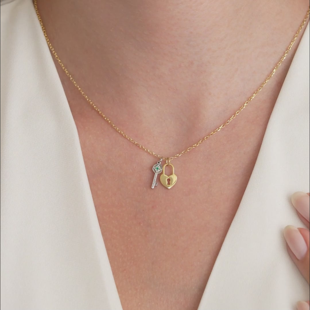 Video of the key and heart lock birthstone necklace worn on the neck